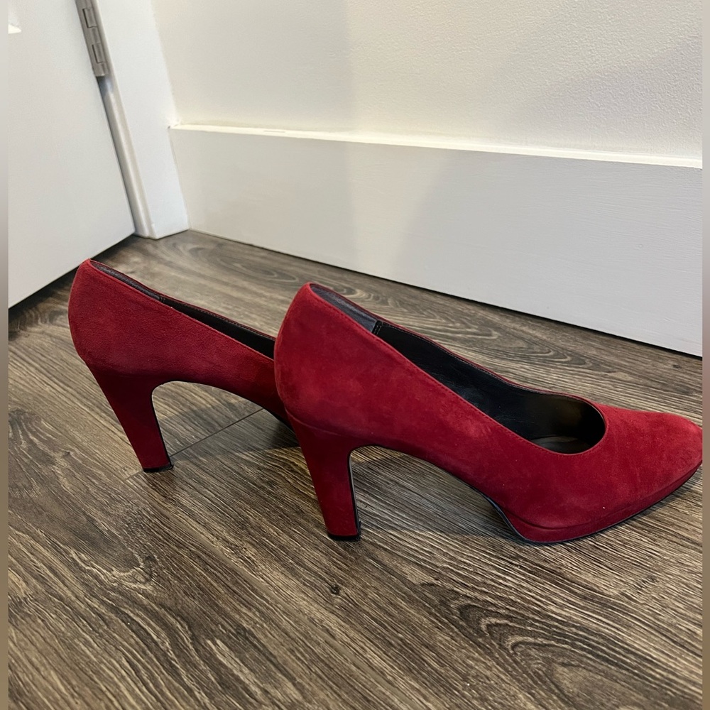 Red suede pumps